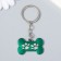 Metal keychain, enamel "Bone with paws" mix 4x3 cm