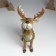 Polystone souvenir "An important elk in a spruce wreath with berries" costs 16.5x10x25 cm