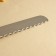 Biscuit knife, large teeth, plastic handle, working surface 30 cm, blade thickness 1.8 mm