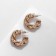 Earrings metal "curl" are wide, color gold