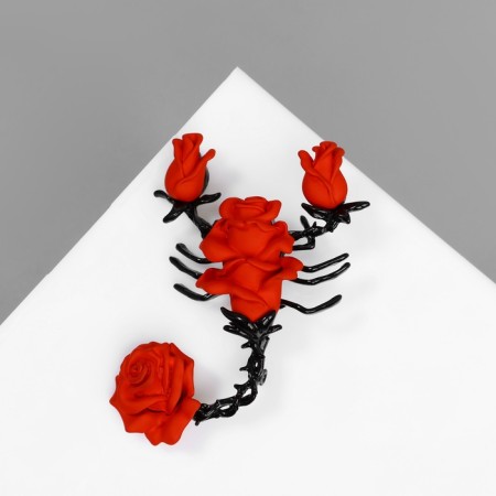 Brooch "Scorpio" rose, red color in ferrous metal