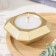 Candle "Square" in the candlestick with beveled corners is small, 9x3.5cm, gold