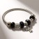 Bracelet Assorted Mardgeri Bant, black color in silver, d = 6.5 cm