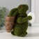 Souvenir Foam "Rabbit green with an testicle and a basket with carrots" 15x7x15.5 cm