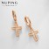 Earrings with rhinestones Xuping Cross blindness, white color in pink gold