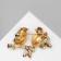 Brooch "Bird" Duet on a branch, colored in gold