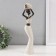 Polystone souvenir "African with a wicker round jug" white 10x6x28 cm
