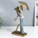 Polystone souvenir "In love pair under an umbrella" Blue-and-white gradient 37.5/31x8.5x15 cm