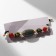 Buslet “Busina Ji” on the lace, oval, colored, d = 7 cm