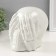 Souvenir Ceramics "Skull with tassels in the eyes" White 13.5x14x15 cm