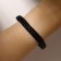 Unisex Bracelet "Kosichka" is smooth, black color with gray metal, 22 cm