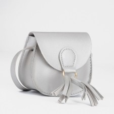 Baby bag for a girl on a magnet, the color is gray