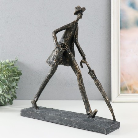 Polystone souvenir "A man with an umbrella. On a date" for metal 31.7x12x34.4 cm