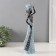 Polystone souvenir "African with a plate on his head" White with a blue 10.5x6.5x33 cm