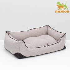 A sunbed with a pillow and a cante 