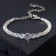 Bracelet with rhinestones "Zircon" Izk, arc, white color in silver, 15cm