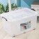 Container for storage with a lid, 50 l, 61 × 39 × 32 cm, on wheels, the color is transparent