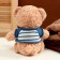 Soft toy "Bear" in a striped jacket, 25 cm, color mix
