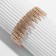 Bracelet with rhinestones "Illusion" drops, white color in gold
