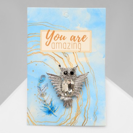Owl brooch with open wings, white color in silver