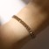 Bracelet with rhinestones "shine" 2 rows, white color in gold, 18cm