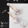 Earrings with rhinestones "Magic" hearts, white color in gold