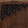 Carved backgammon "bears", from an array of beech, patina, 58 x 56 cm