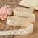 Knitted lace, 25 mm × 15 ± 1 m, beige color