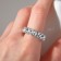 Ring Right Rectangles, white color in silver, dimensionless