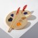 Brooch "Palette" with brushes, colored in gold
