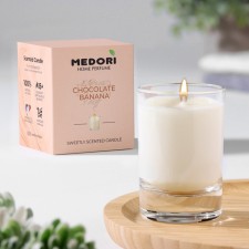 Aromatic candle in a glass of Medori 