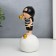 Polystone souvenir "Baby in a black cap, with a gold bubble on the ball" 15x7x7 cm