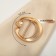 A buckle for a scarf "chanterelle" with a ponytail, color matte gold