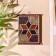 Key "millenium" wood, metal, textiles, stone, glass 5.5x17.5x22.5 cm dark