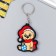 EVA keychain "Bear in the New Year's cap, with a Christmas ball" 5x3.6 cm