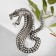 Brooch "Snake" Cobra, white color in black silver