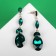 Hanging earrings with “Party” rhinestones path of drops, emerald color in gold, 7 cm