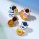 Set of badges (4 pcs.) "Cosmonauts" on the moon, color in gold