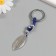 Keychain from the evil eye Metal "leaf" 2.2x7.5 cm