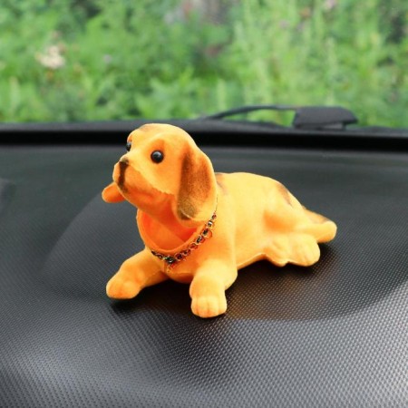 Dog on a car panel shocking his head, a large, red color-2