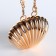 Female bag on a magnet, gold color