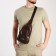 Male sling bag, artificial leather, headphone opening, brown color