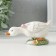 Polystone souvenir "Gusenok with a pink bow in a clearing" 12x5x5.5 cm