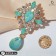 Brooch "Empress" Gamma, white-green color in gold