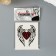 Tattoo on the body "Wings with a red heart"