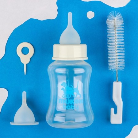 A set for feeding "Pigzon", a bottle of 150 ml, with 2 nipples and a ruff, white