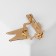 Brooch "Tooth" with a brush, the color is red-white in gold