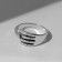 Ring "capture", color black silver, dimensionless