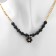 A decarative -based pendant -basis “flower” amelia, black color in gold, 45cm