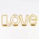 Summary of the metal desktop "Love", 13.5 x 42 cm, gold